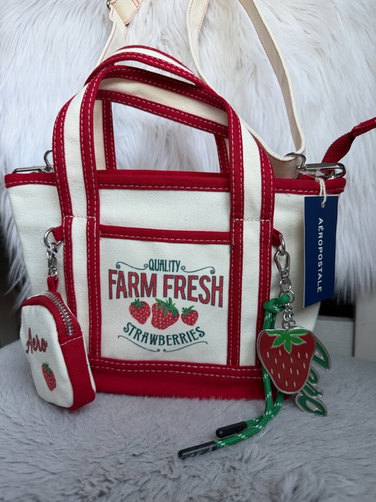 Aeropostale Handbags - Aeropostale Red & Cream Strawberry Canvas Tote Crossbody with Strawberry Charm